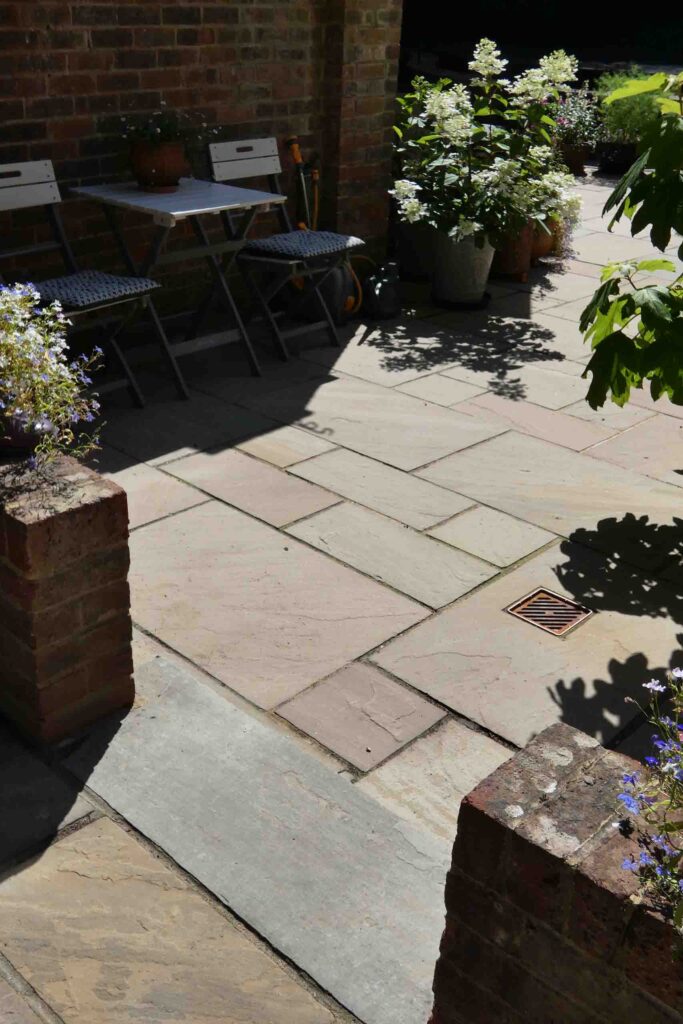Indian Sandstone Patio in Ivy Hatch by Brick by Brick Construction & Landscape