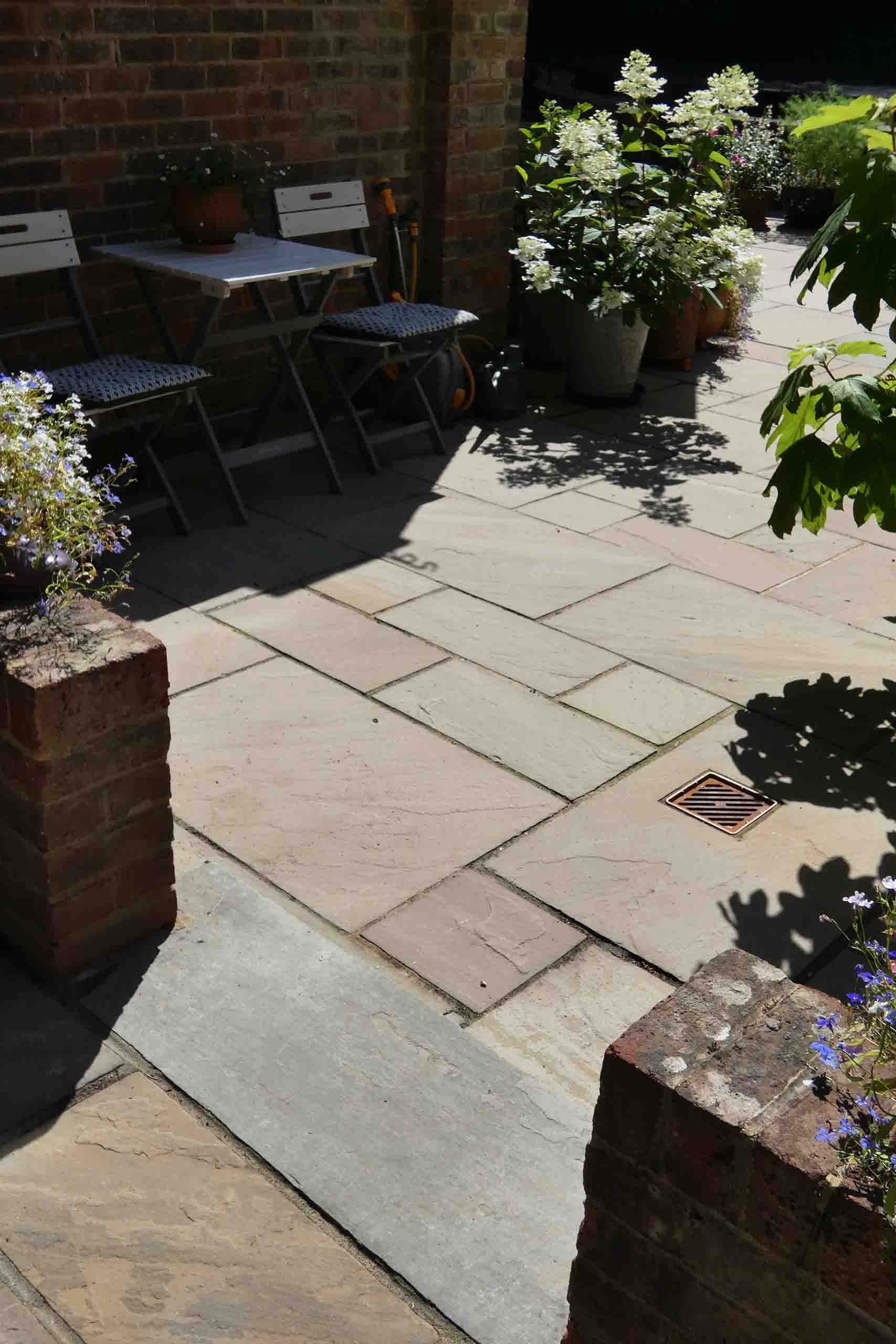 Indian Sandstone Patio in Ivy Hatch by Brick by Brick Construction & Landscape
