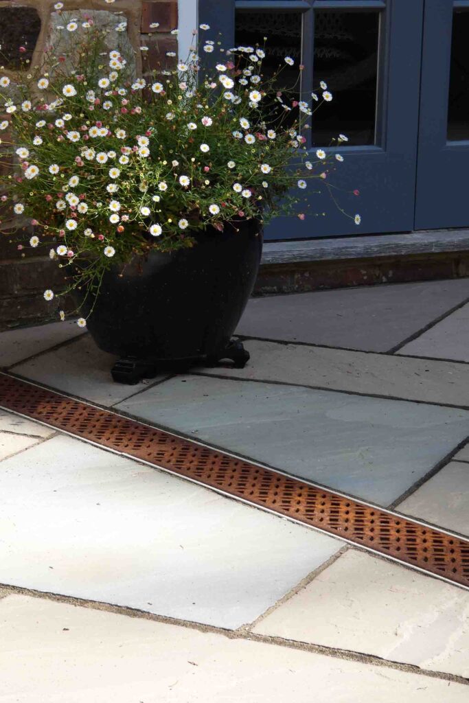 Indian Sandstone Patio in Ivy Hatch by Brick by Brick Construction & Landscape
