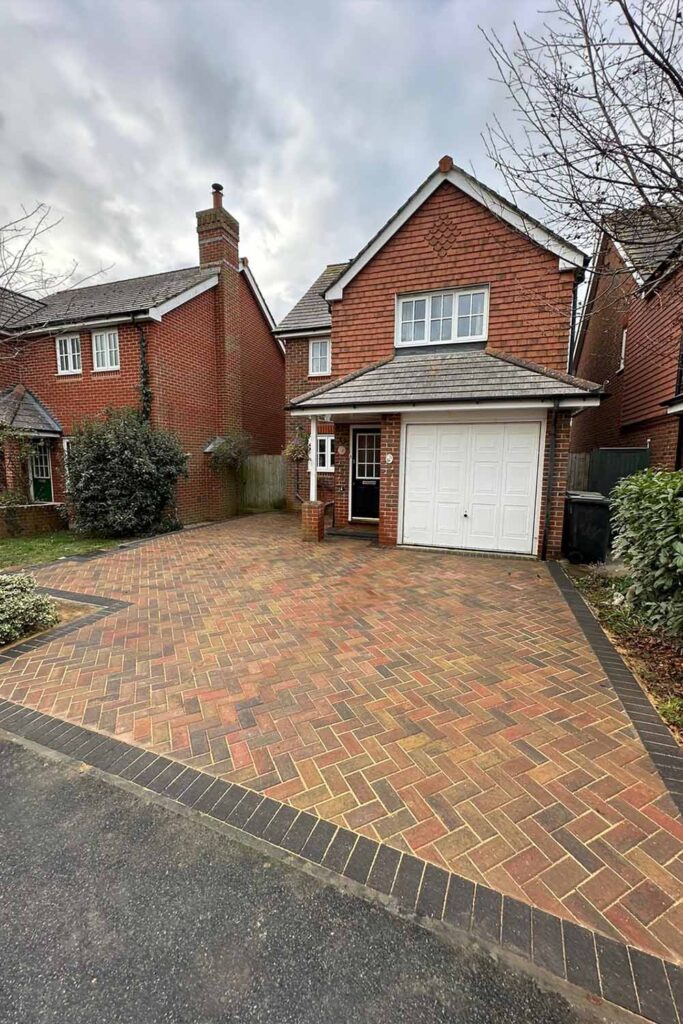 Autumn Mix Herringbone Block Paved Driveway with Charcoal border by Brick by brick construction & Landscape
